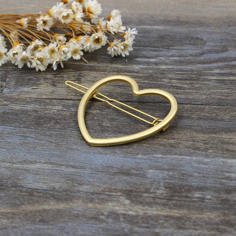 Broche en forma de corazón o estrella - Image 2