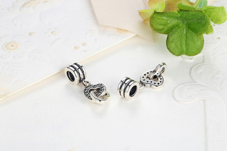 Charm colgante Corazones entrelazados