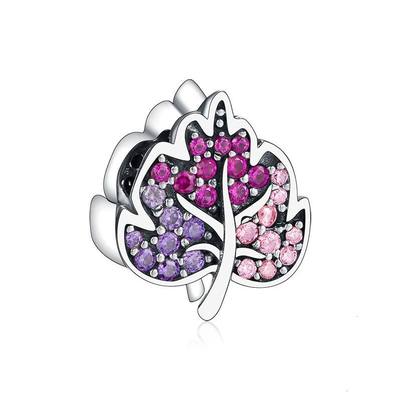 Charm Hoja reluciente Disponible en color plateado y oro rosa